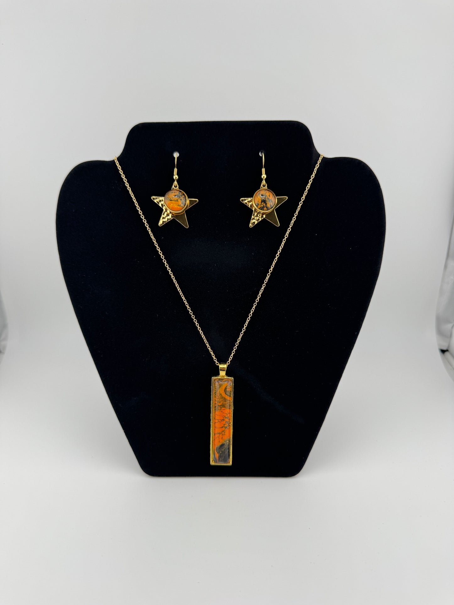 Orange/Back and Gold Necklace with Star Earrings